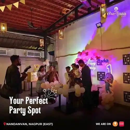 Guests enjoying party celebration at The City Dhaba with balloons, cake, and traditional dhaba-style food